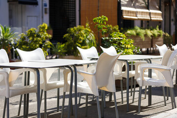 Close-up of tables in the city cafe