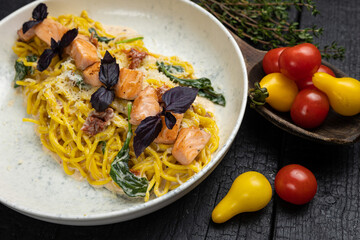 delicious pasta on a dark table in a restaurant
