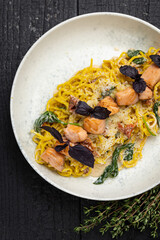 delicious pasta on a dark table in a restaurant

