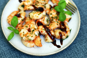 Asian style cooked shrimp with hot spices on a plate.