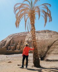 person walking in desert in egypt aswan