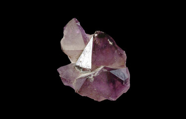 An sample of the mineral amethyst quartz on a black background