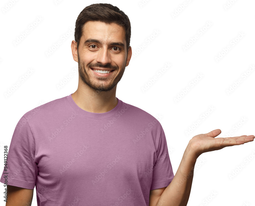 Wall mural young smiling man showing on the right with empty hand or on palm. copy space for your product