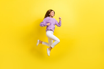 Fototapeta na wymiar Full length photo of cheerful excited lady stylish knitted outfit interested look hurry empty space isolated on yellow color background