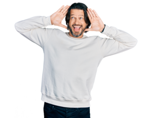 Middle age caucasian man wearing casual clothes smiling cheerful playing peek a boo with hands showing face. surprised and exited