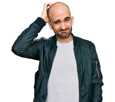 Young hispanic man wearing casual clothes confuse and wonder about question. uncertain with doubt, thinking with hand on head. pensive concept.