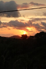 beautiful sunset over the hill in portrait angle 