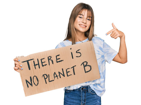 Teenager caucasian girl holding there is no planet b banner smiling happy pointing with hand and finger