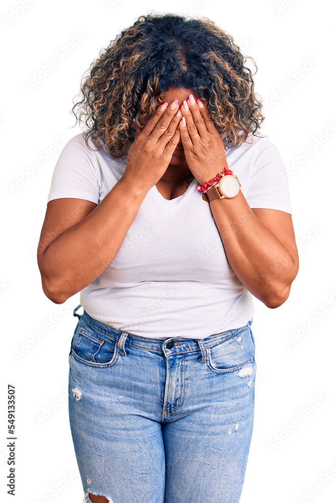 Poster Young african american plus size woman wearing casual clothes with sad expression covering face with hands while crying. depression concept.