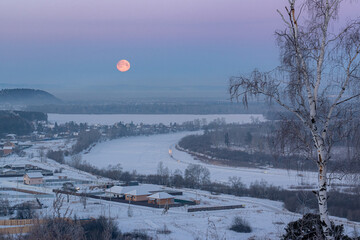 Full moon rising over the Irkut river