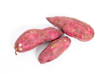 Red sweet potato isolated on white background