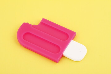 Silicone pink pot holder with a popsicle design