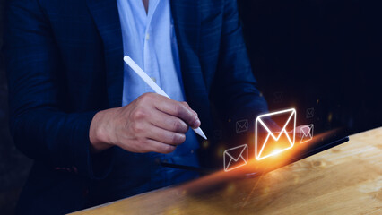 Businessman touching checking email online with virtual interface technology.Direct marketing, online message, E-mail, electronic mail,communication concept.
