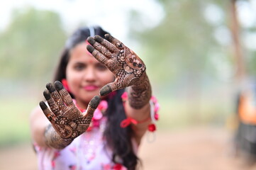Beautiful Henna on hands. Indian bride Mehendi Ceremony. Henna art tattoo wedding design. Wedding...