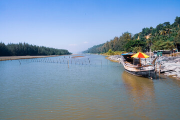 Fototapeta premium A beautiful river, a boat in the river, natural beauty