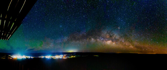 panoramic of full arc of milky way, aerial view from a town in mexiquillo durango 