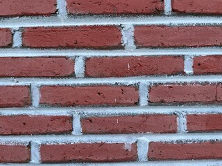 Background of realistic red brick wall image texture.