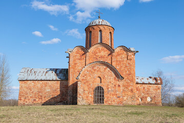 Fototapeta na wymiar Medieval Church of the Transfiguration of the Savior on Kovalev close-up on a sunny April day. Neighborhood of Veliky Novgorod, Russia