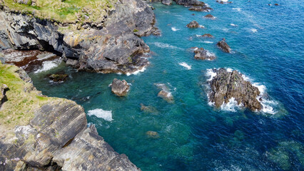Beautiful rocky shore. Turquoise sea water. Seaside landscape. Nature of Ireland. Landscapes of West Cork. Drone point of view.