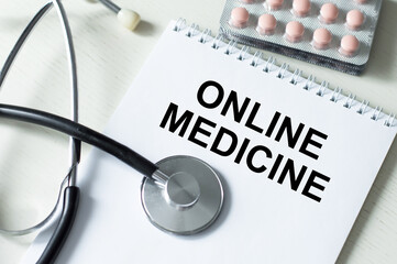 Online medicine text on a paper tablet, Medical concept.