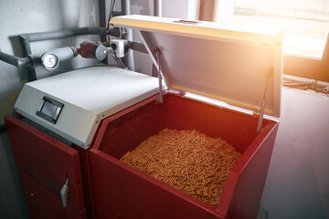 Pellet stove full of fuel. Better future and sustainable concept with renewable house heating