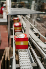 Huge factory line for sweet food and cookies production. Close up shots of industrial manufacturing packaging process.