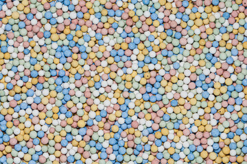 Colorful clay beads background texture.