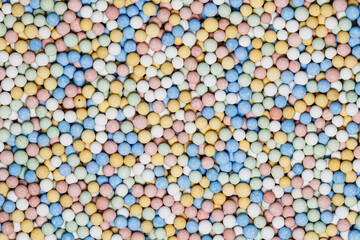 Colorful clay beads background texture.