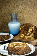 Delicious homemade marble pound cake with bottle of milk and hazelnut