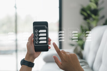 A businessman works with a smartphone. Check marks in the check boxes successful completion of business tasks. Digital marketing statistics. Business management is the goal of strategy.