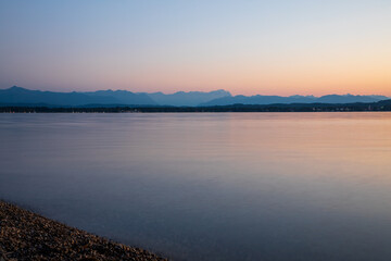 Fototapeta na wymiar medidation at the lake shore, beautifull panoramic lake shore - lake Starnberg