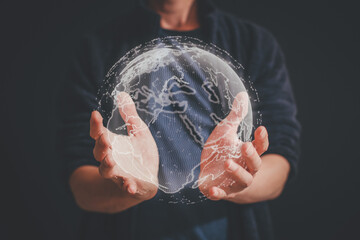businessman holding Global network connection. Big data analytics and business intelligence concept. World map point and line composition concept of global business.Digital link tech.