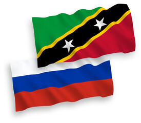 Fototapeta premium National vector fabric wave flags of Federation of Saint Christopher and Nevis and Russia isolated on white background. 1 to 2 proportion.