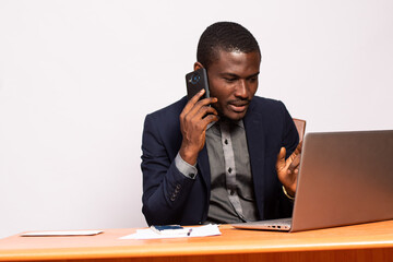 business man making a phone call while working