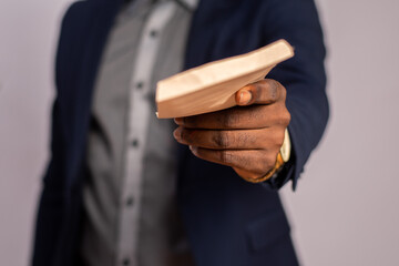 businessman giving someone an envelope