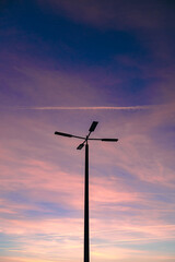 Obraz premium wind turbine at sunset