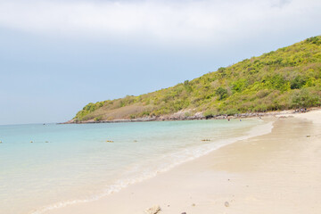 Beautiful tropical Thailand island panoramic with beach, white sea, mountain and coconut palms for holiday vacation background concept. Suitable for relaxing in summer when traveling together family.