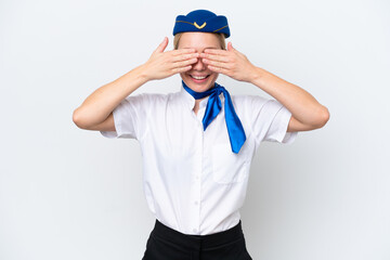 Airplane blonde stewardess woman isolated on white background covering eyes by hands