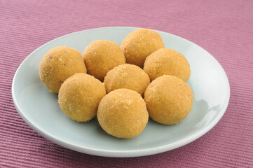 Besan ladoo, an Indian sweet dish made during festivals or celebrations like weddings
