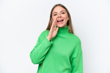 Young beautiful blonde woman isolated on white background shouting with mouth wide open