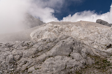 Landscape of Yulong Snow Mountain, it also known as Jade Dragon Snow Mountain which is located in Yunnan,China. People can seen exploring around it.