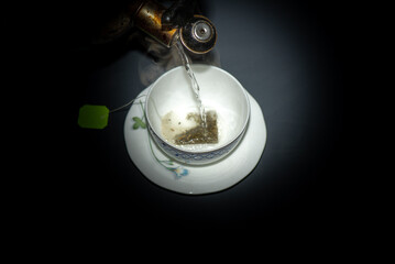 It is a picture of green tea in a cup.