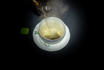 It is a picture of green tea in a cup.