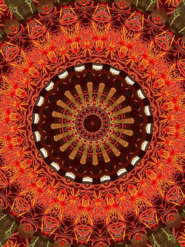 Abstract view of a photo of fireworks - created as a mandala to represent the vibrant colors of the fireworks in the night sky