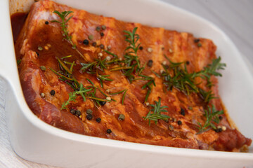RECIPE FOR SPARE RIBS WITH BBQ, MARINATED IN SWEET SMOKED PAPRIKA, ESPELETTE PEPPER, HONEY, OLIVE OIL, ROSEMARY AND THYME, High quality photo