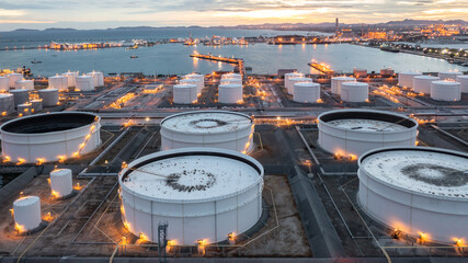 Aerial view oil storage tank in oil terminal at night, Oil storage tank farm storage petrochemical...