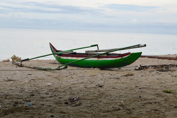 Fototapeta premium Daplangu Sumur Beach, Pandeglang, Indonesia – October 09, 2022: The Best Spots To Enjoy The Beach Atmosphere. With Selected Focus.