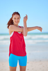 Beach, fitness and woman stretching arms in training to warm up body for running exercise or workout. Smile, portrait and happy sports girl ready to start her summer body challenge for wellness goals