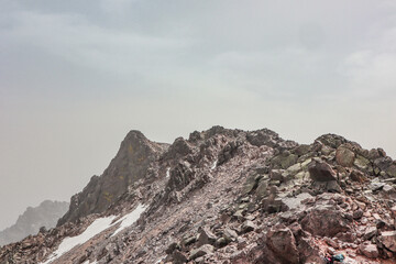 Mountains with snow. Some beautiful views during the long distance hike GR20 in Corsica.