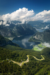 View of the mountains, lakes and a road in the foreground from the 5Fingers view point at Dachstein Mountain in Austria, Alps. Hallstatt.